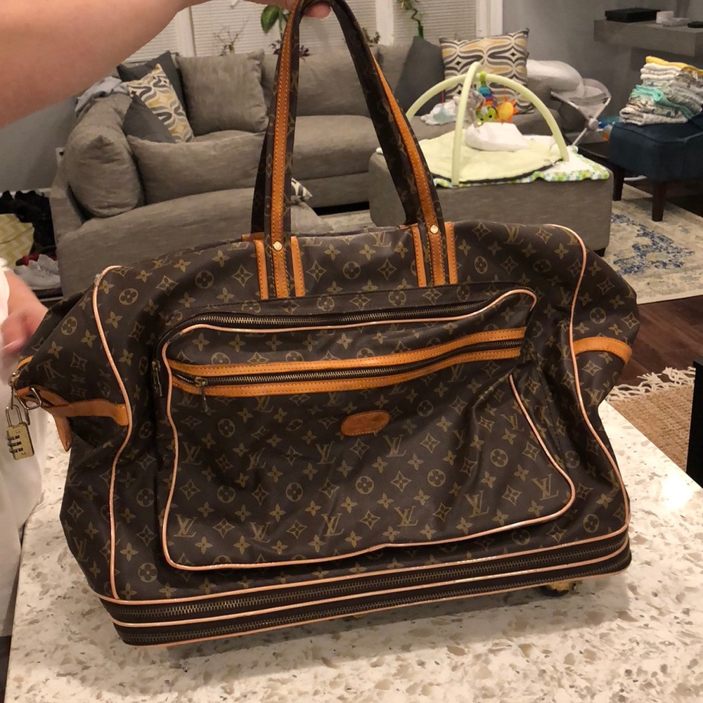 Louis Vuitton expandable suitcase